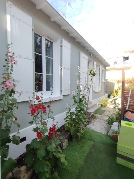 Façade fleurie MGP MENUISERIE PEINTURE TOUS TRAVAUX